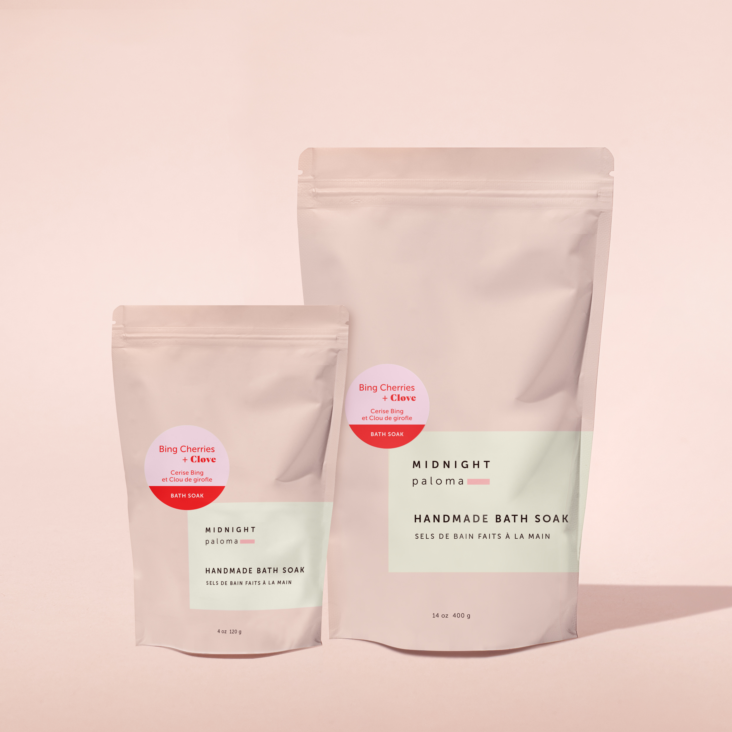 Bing Cherries + Clove Bath Soak in two resealable pouch sizes with soft pink scent sticker. Packaging system and layout by Danielle Gracioso.
